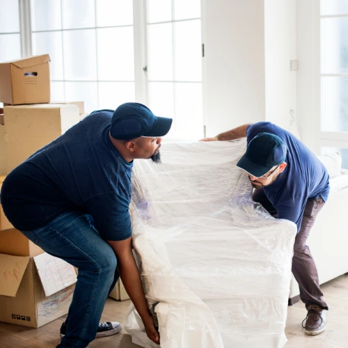 Skilled villa movers handling sofas beds tables and household furniture in JLT