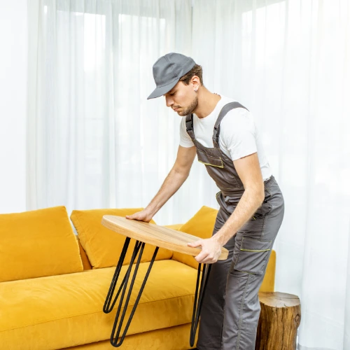 Villa movers handling sofas beds tables and household furniture in Bur Dubai