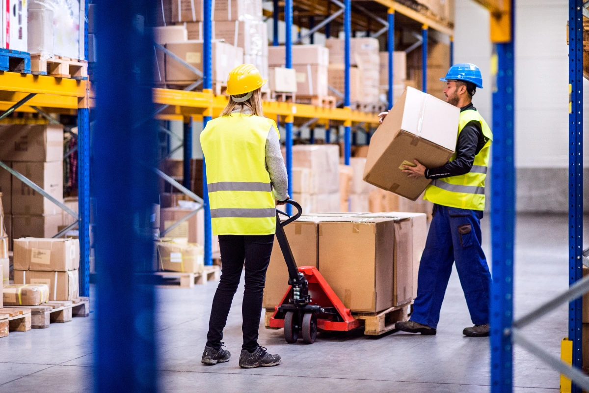 Professional warehouse movers in Dubai handling industrial equipment and inventory relocation